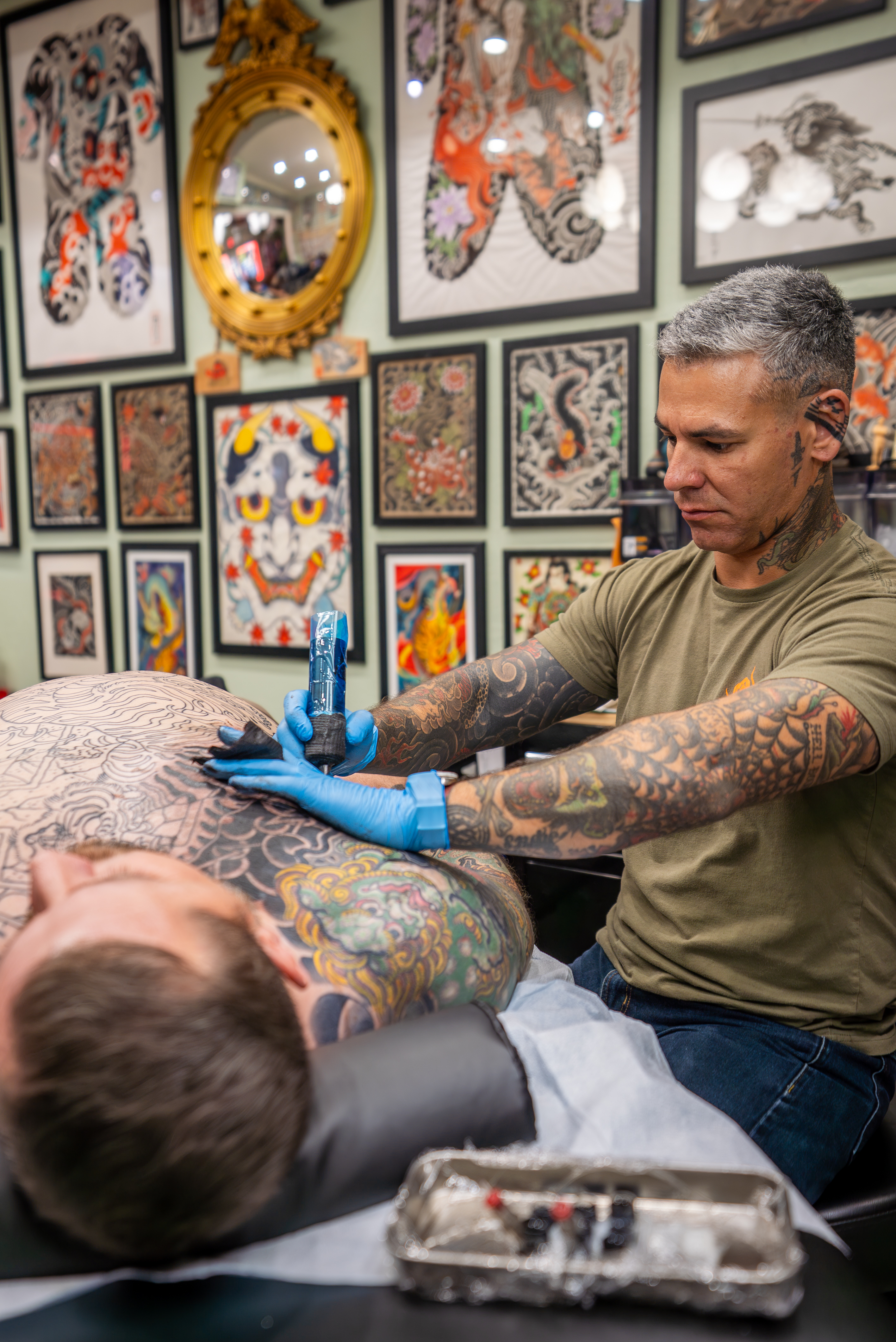 Chopper working on a large Japanese tattoo