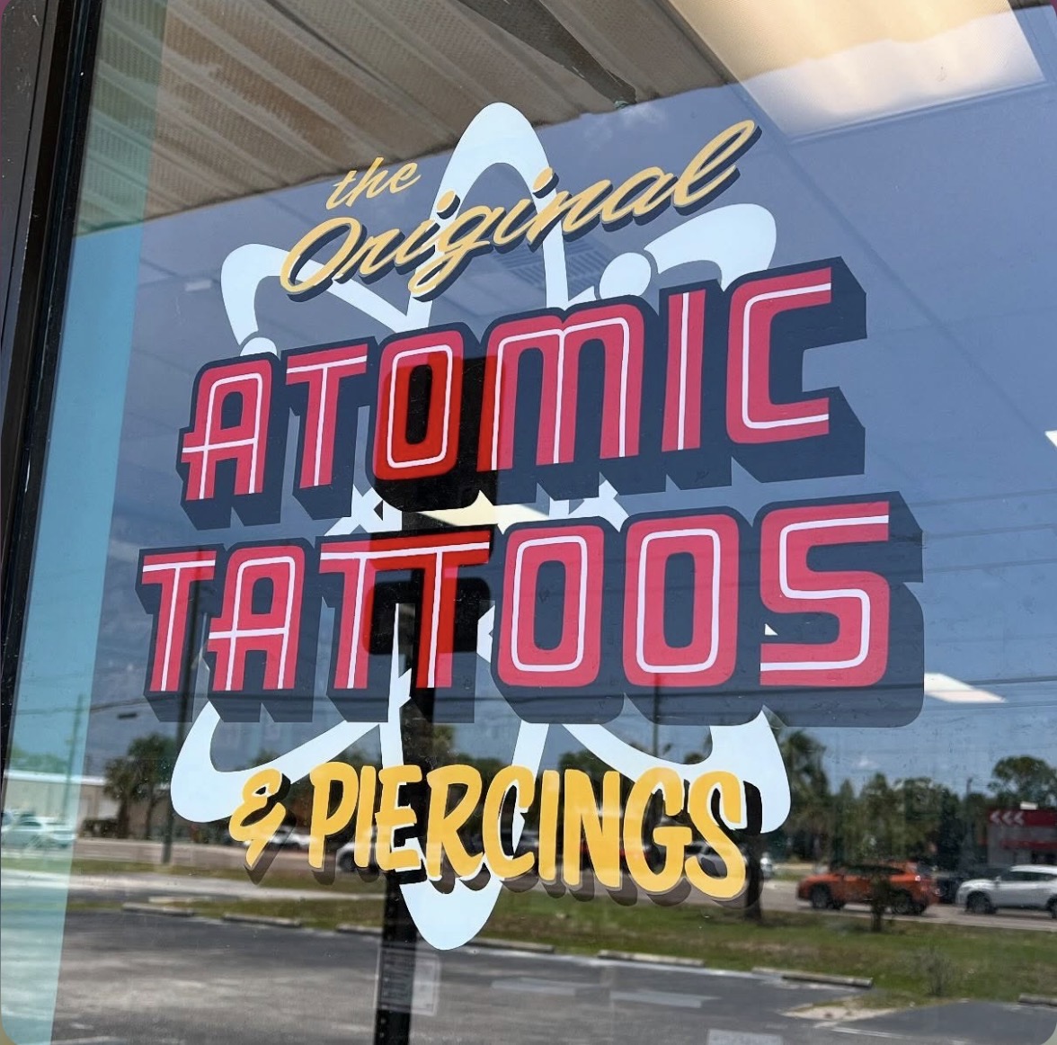 Atomic Tattoos largo door logo