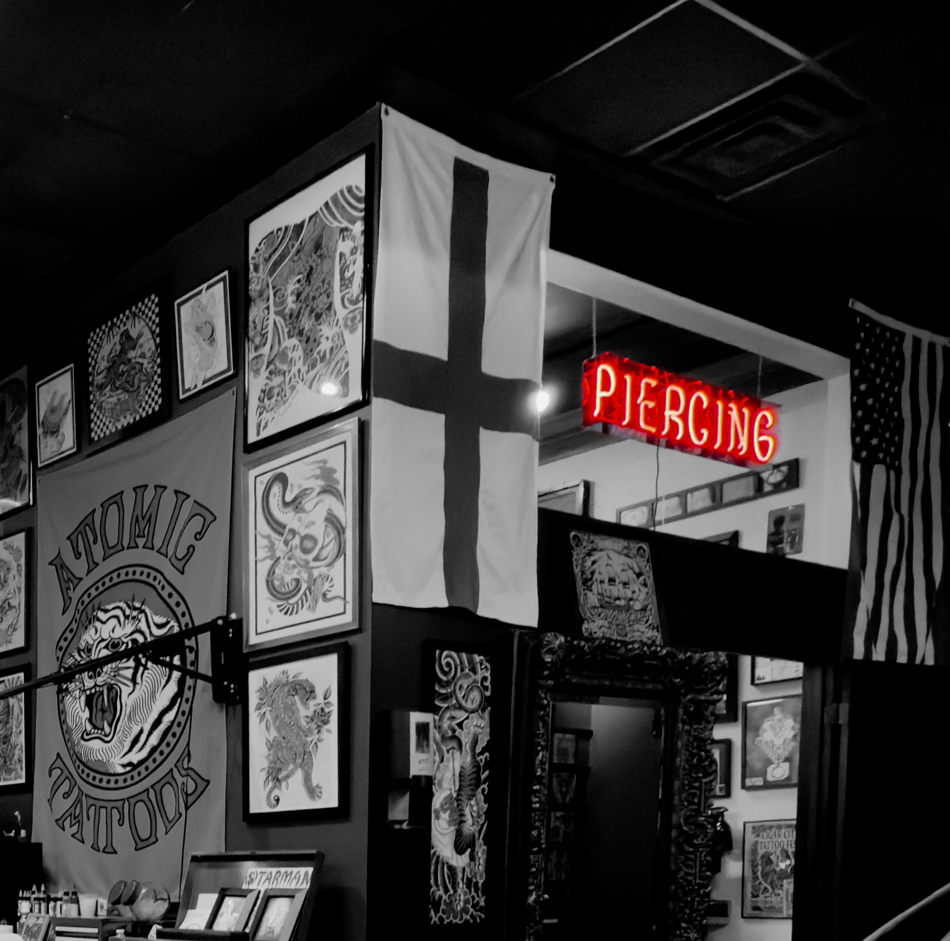 Body piercing sign in Brandon mall Atomic Tattoos
